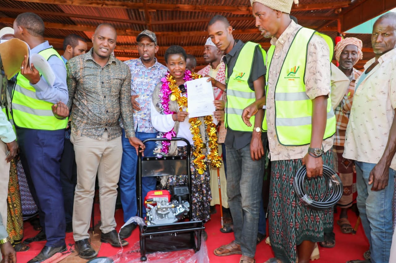 PS officially handover over a fully equipped car wash facility and Certificate of registration to 18 groups