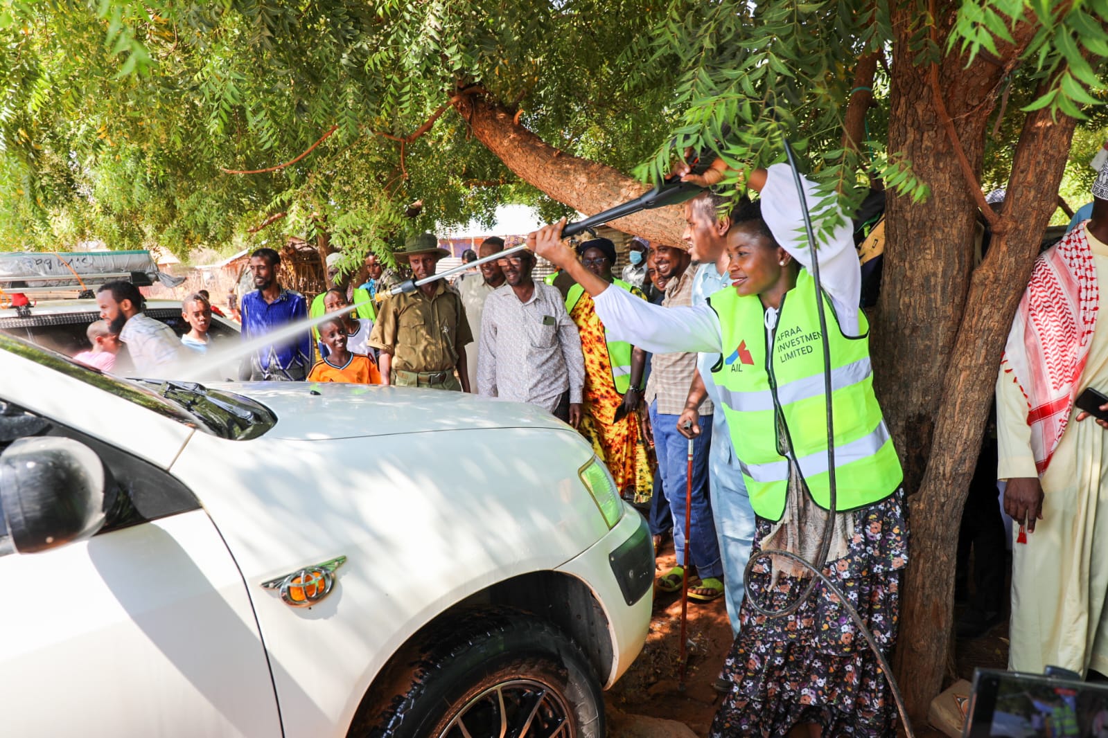 PS officially hands over a fully equipped car wash facility and Certificate of registration to 18 groups