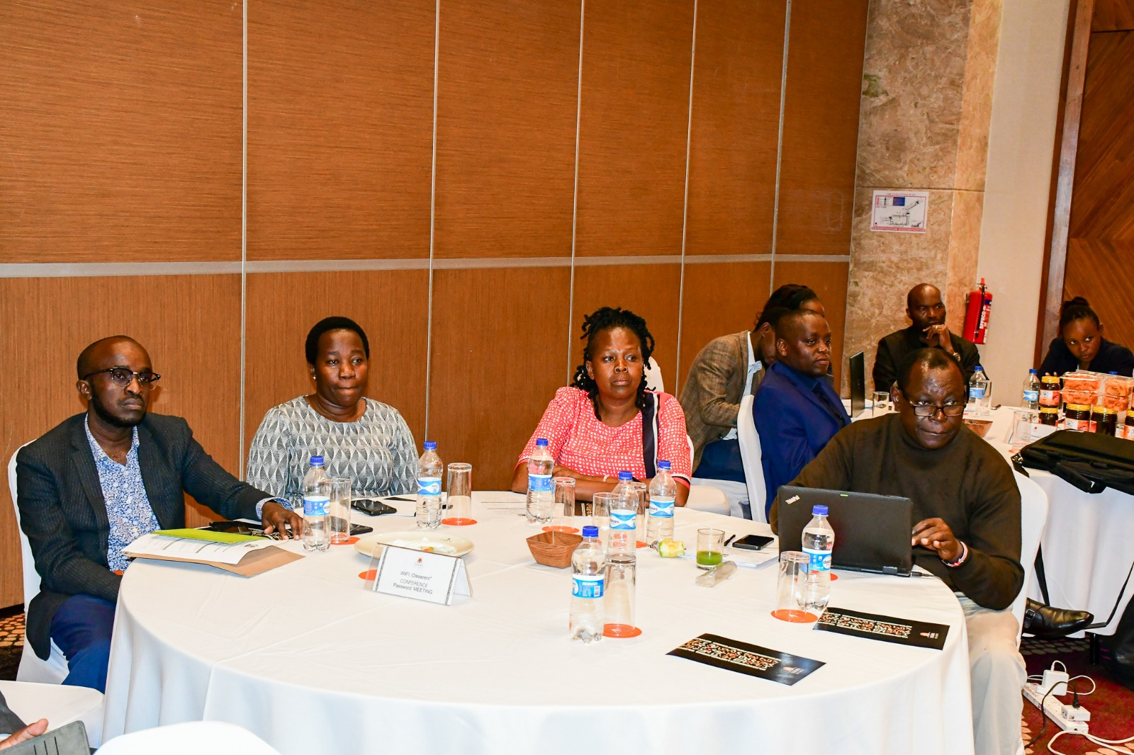 Various members present at the validation workshop