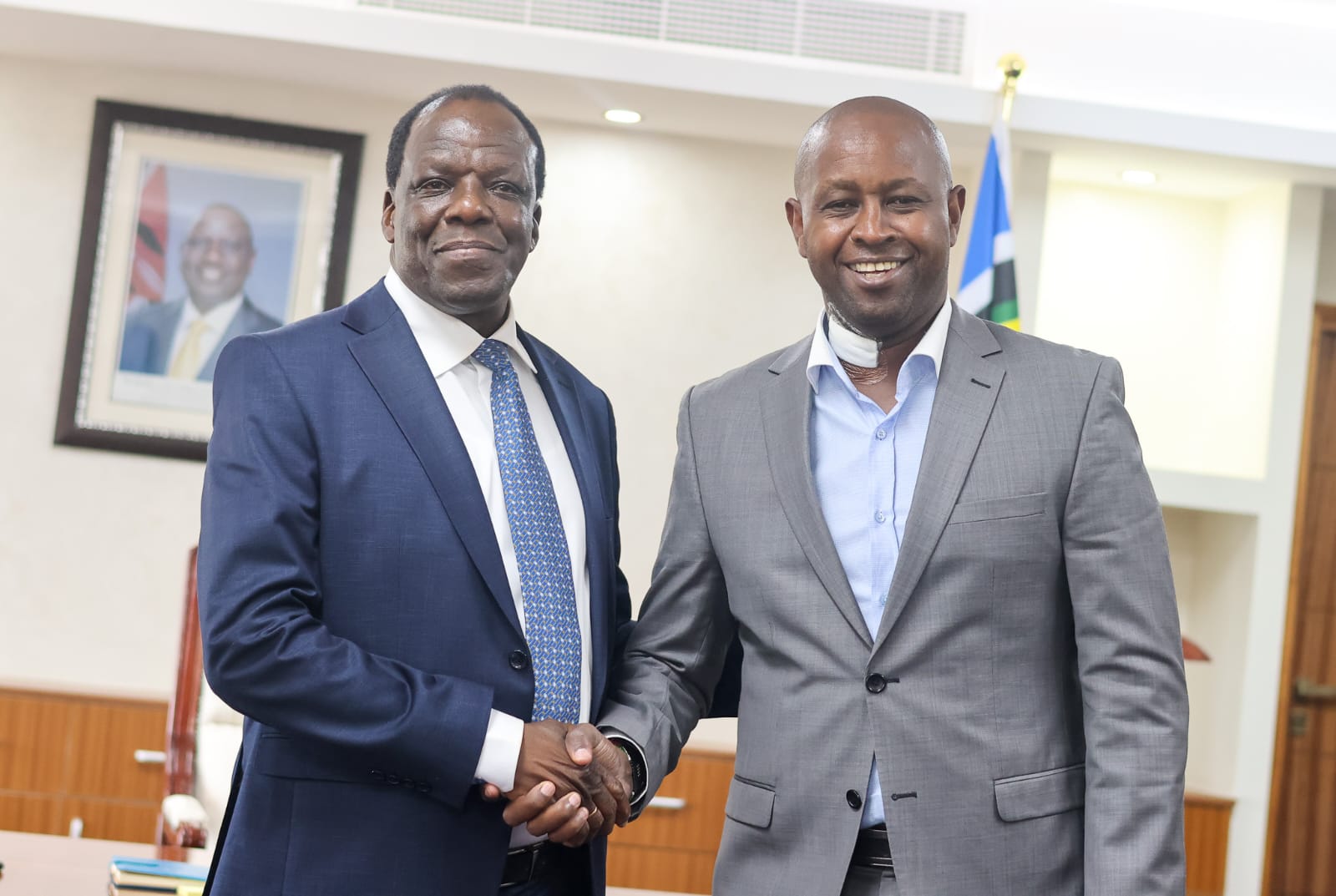 Newly appointed Ministry of Co-operatives and MSME CS handshakes PS. Co-operatives Hon. Patrick Kilemi