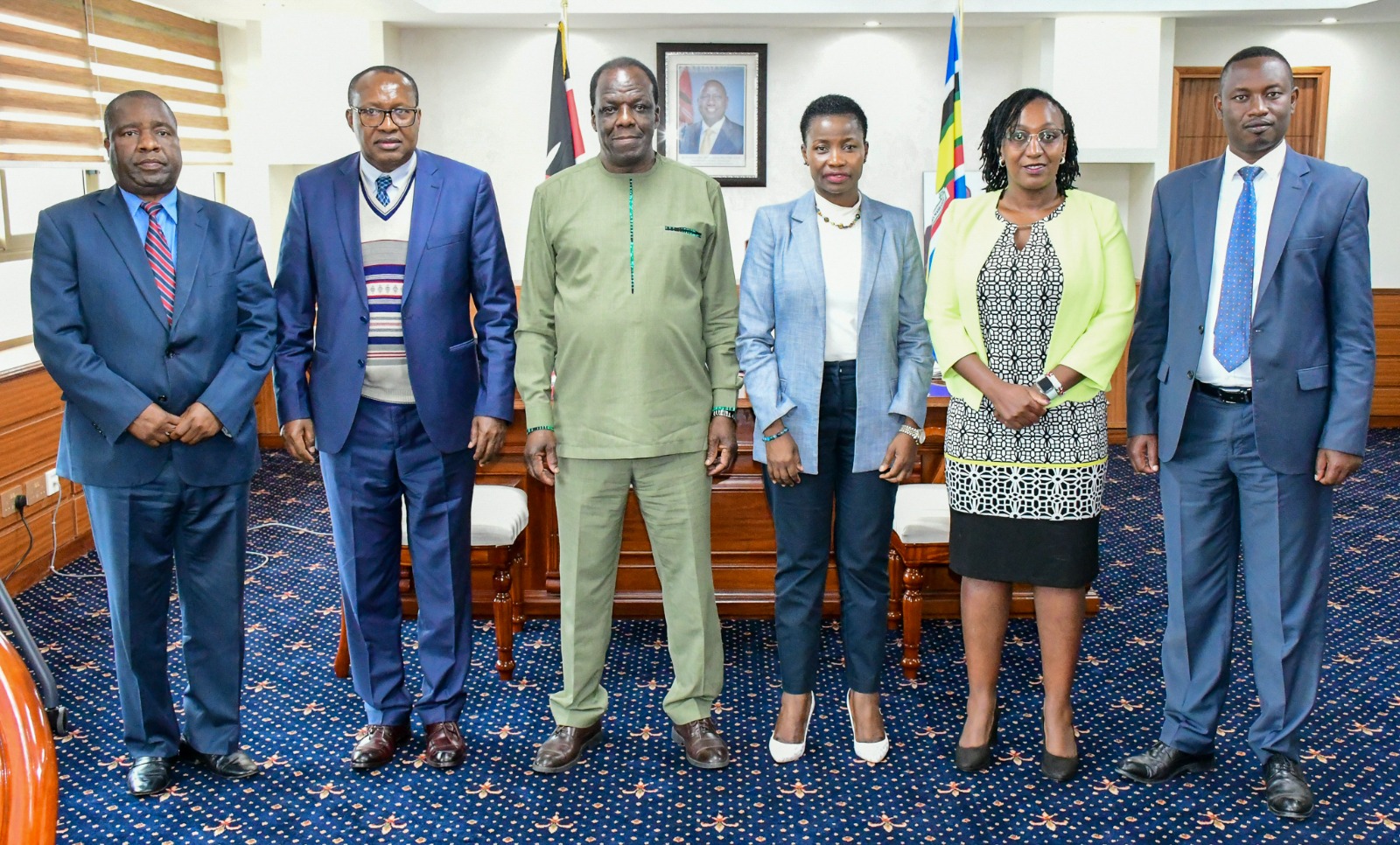 Director Administration Mr. James Ntabo (left), Ag. Managing Director KIE CPA Charles Mativo, CS. Hon. Wycliffe Oparanya (centre), PS Hon. Susan Mangeni, Ag. CEO Hustler Fund Elizabeth Nkukuu and Mr. Peter Lengapiani, CEO Uwezo Fund pose for a photo after fruitful discussions 