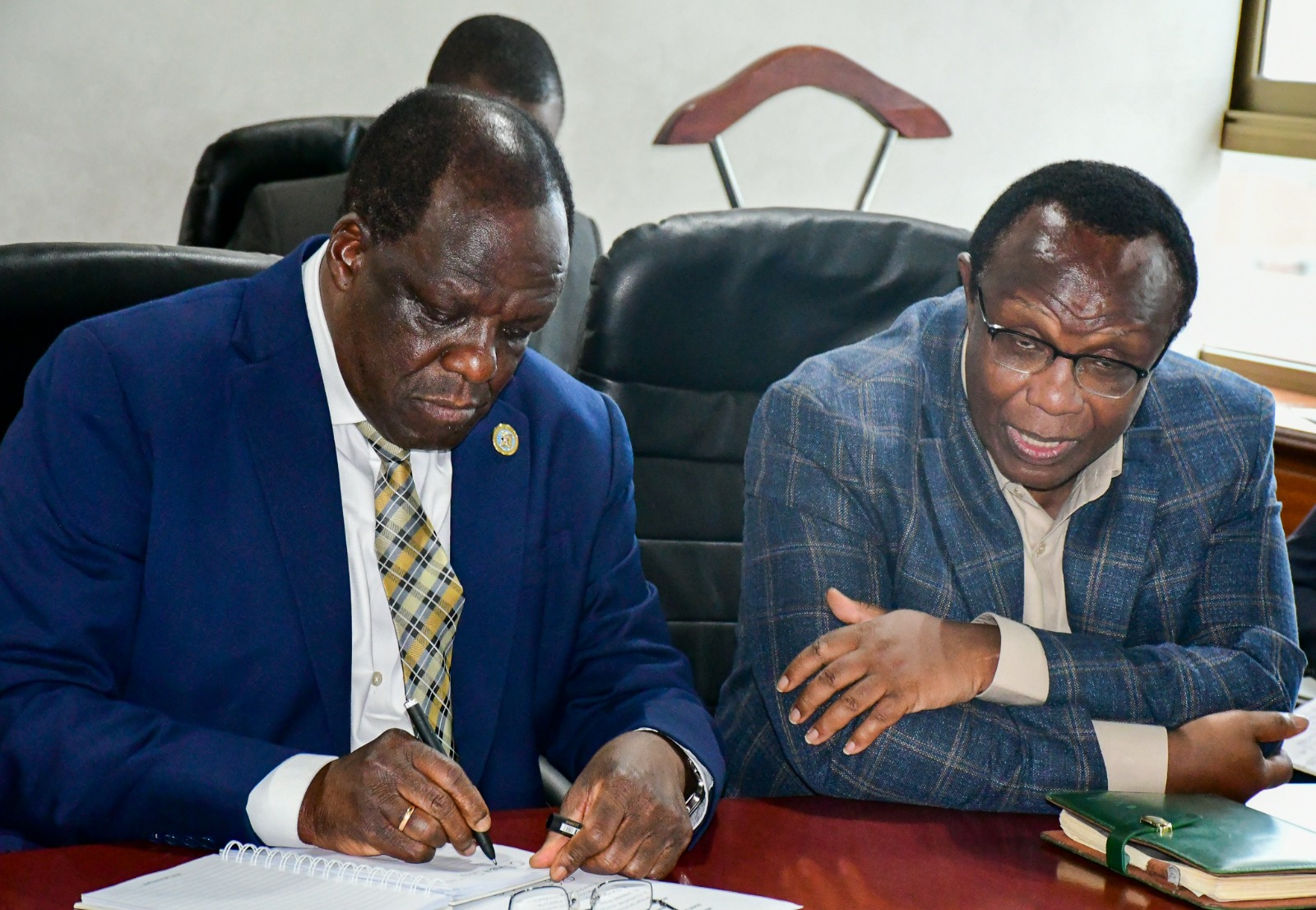 CS Hon. Oparanya alongside government economic advisor, David Ndii