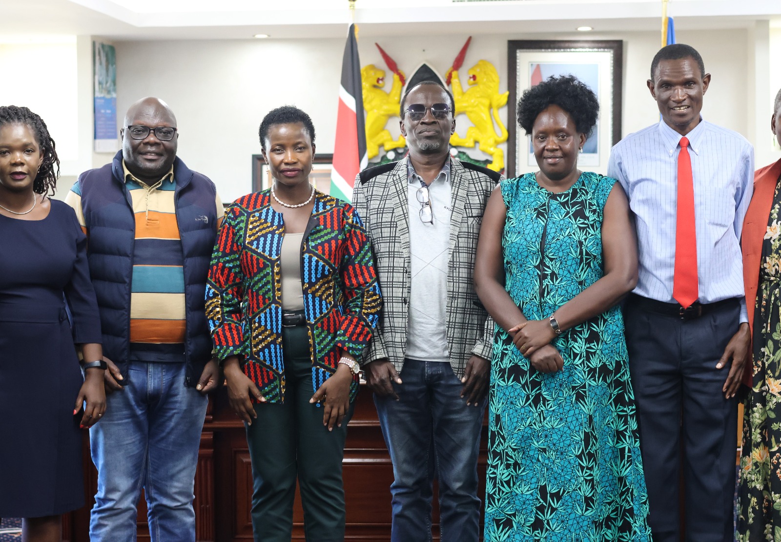 The Principal Secretary MSME, Hon. Susan Mang'eni and members of Busia Professional Association pose for photos after fruitful deliberations