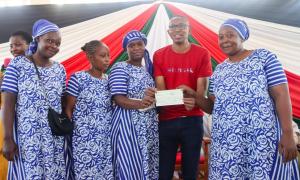 Nyali MP pose for a photo alongside Uwezo Fund beneficiaries