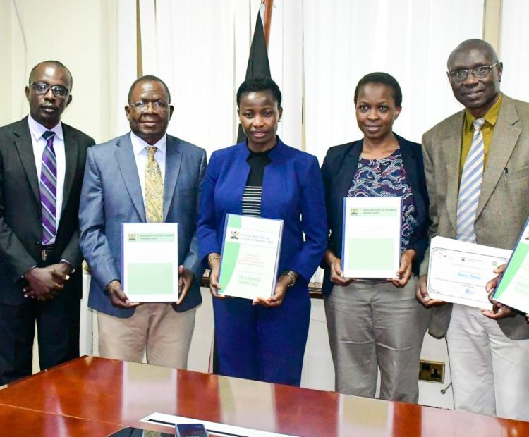 PS MSMEs Development and stakeholders from KIBT showcasing MSMEs Development Training Manual 