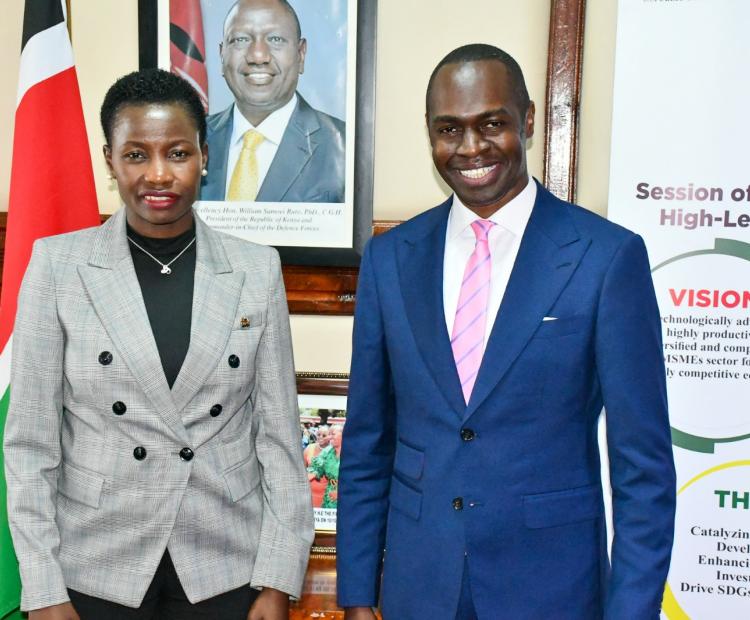 PS MSME poses for a photo with Dr. Bernard Chitunga, Ph.D