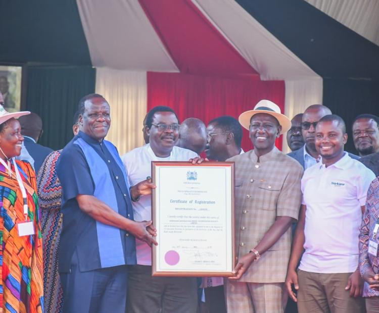 President of the Republic poses for a photo alongside Cabinet Secretary Co-operatives and MSMEs Development